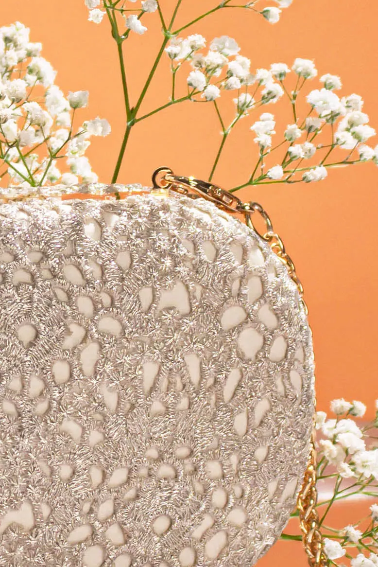 Ivory Cutwork Capsule Clutch